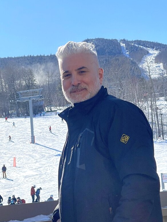 Daniel Kaufman, founder of DEK Builds, at a ski resort